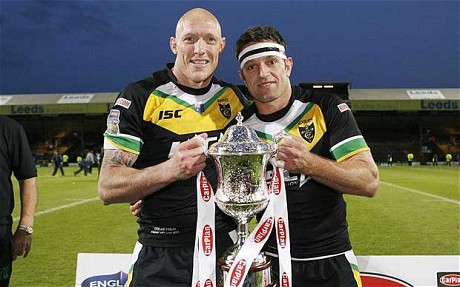 Exile team mates with the trophy