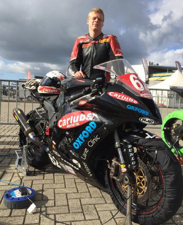Sam West with Carlube sponsored bike
